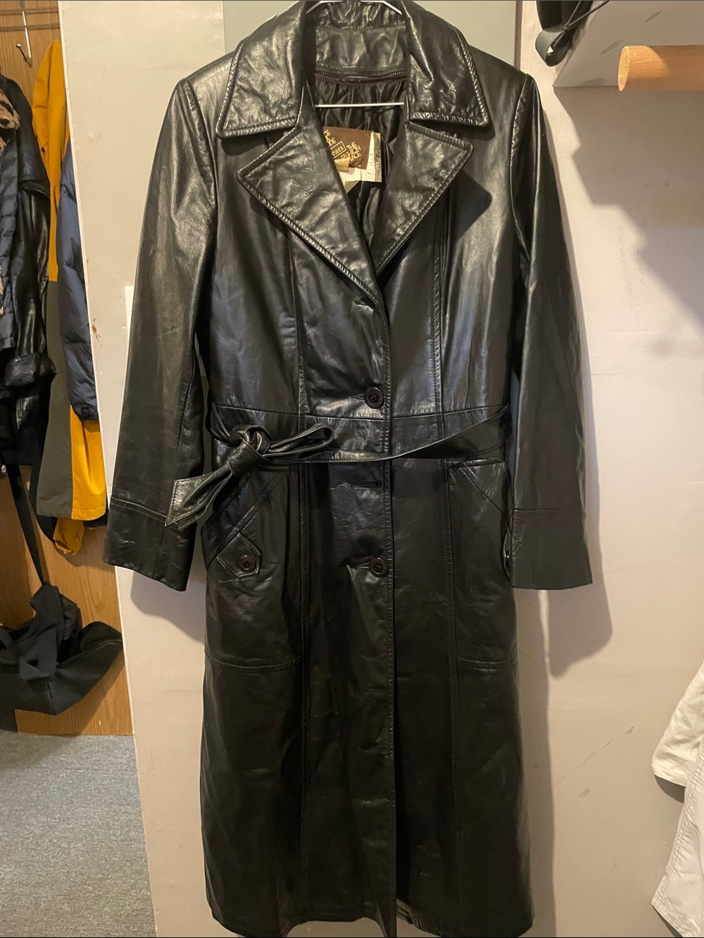 vintage Sears black leather trench coat from the "Place de la Mode